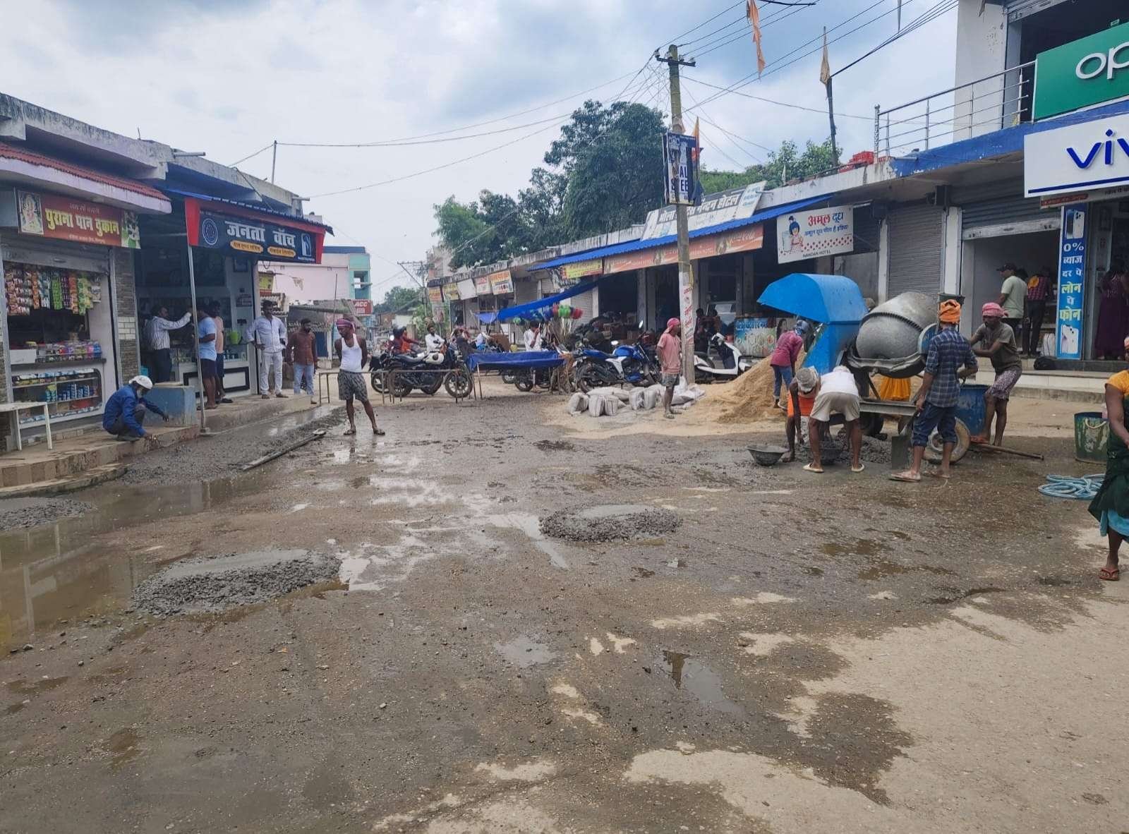 poor condition of government road shopkeepers pool funds to pave it themselves